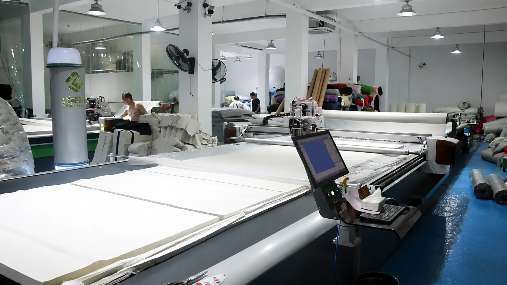 Automated fabric cutting equipment preparing material for bag production